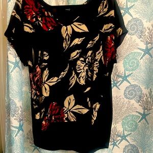 Black cream, V-neck, top silky in the front cotton in the back size large.